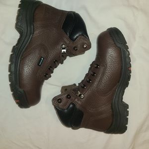Timberland waterproof steel toed boots, size 6.5. Never worn!